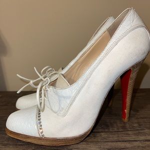 Christian Louboutin White Crocodile/Fabric shoes with Swarovski Crystals.